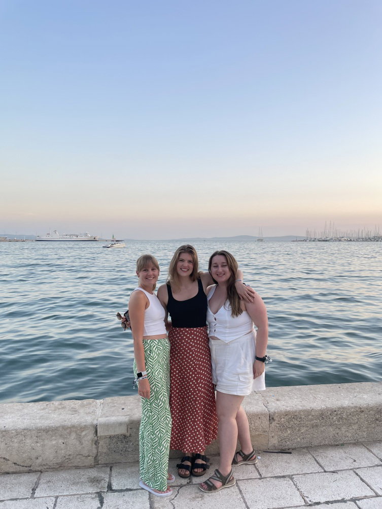 Travellers in front of ocean view in Croatia