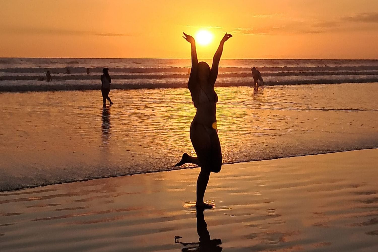 Traveller on the beach at sunset in Costa Rica