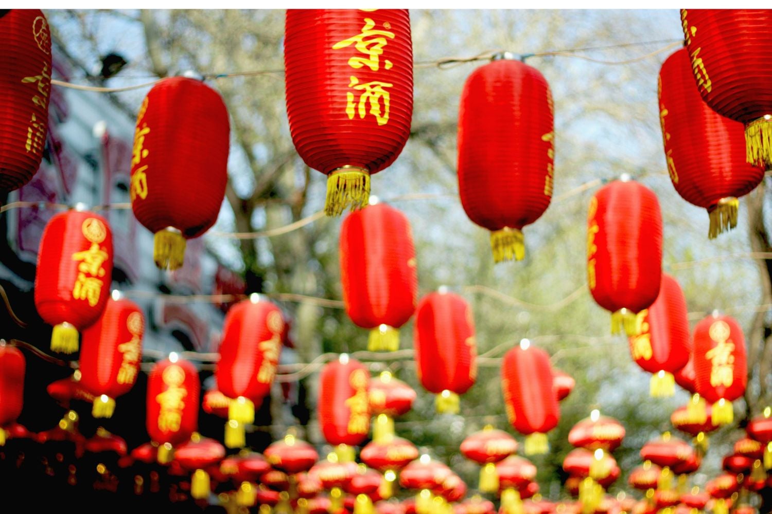 Red Chinese lanterns hanging above street in Beijing city