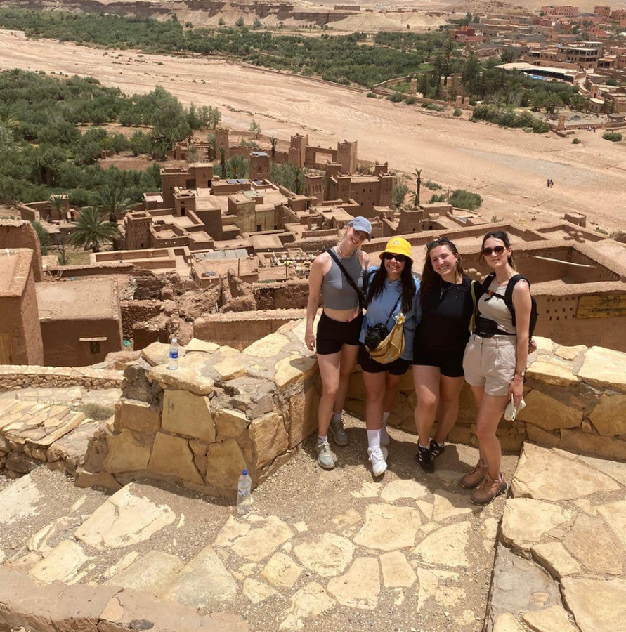 Travellers standing in Ait Ben Haddou in Morocco