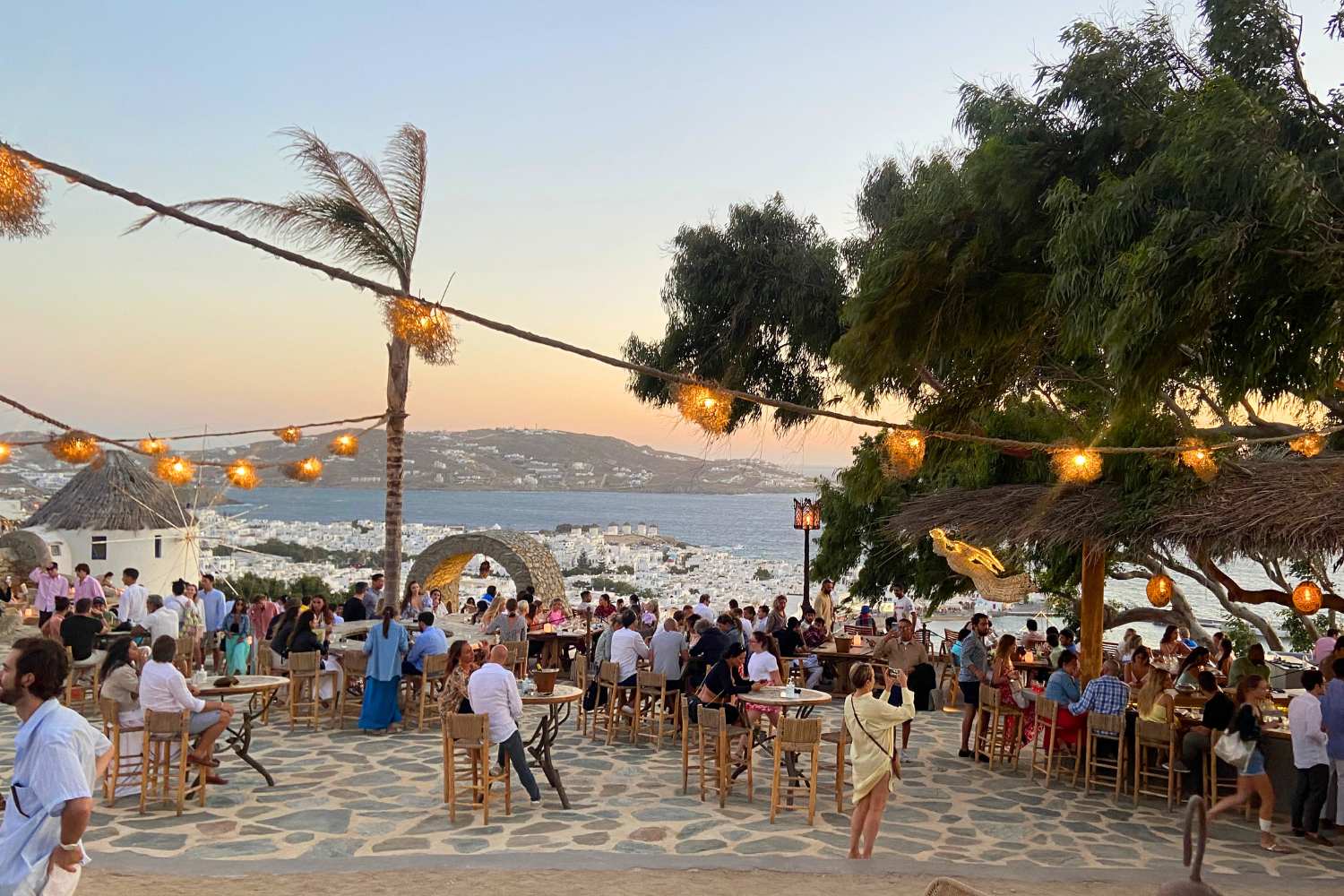 Beach club at sunset with views of the sea in Greece