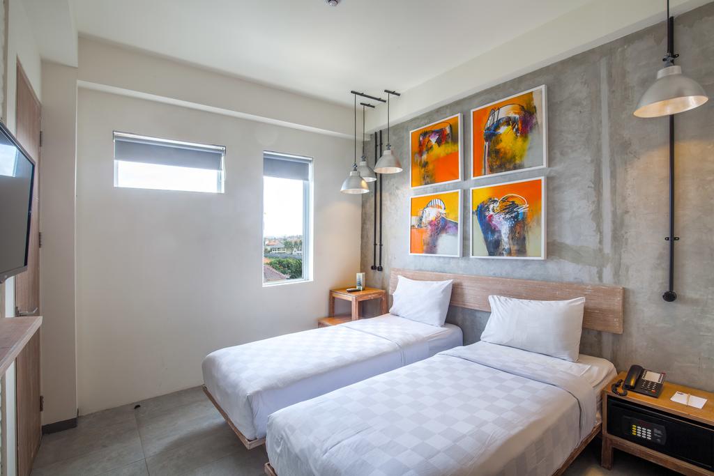 Twin accommodation with beds and hotel room in Canggu Bali, Indonesia