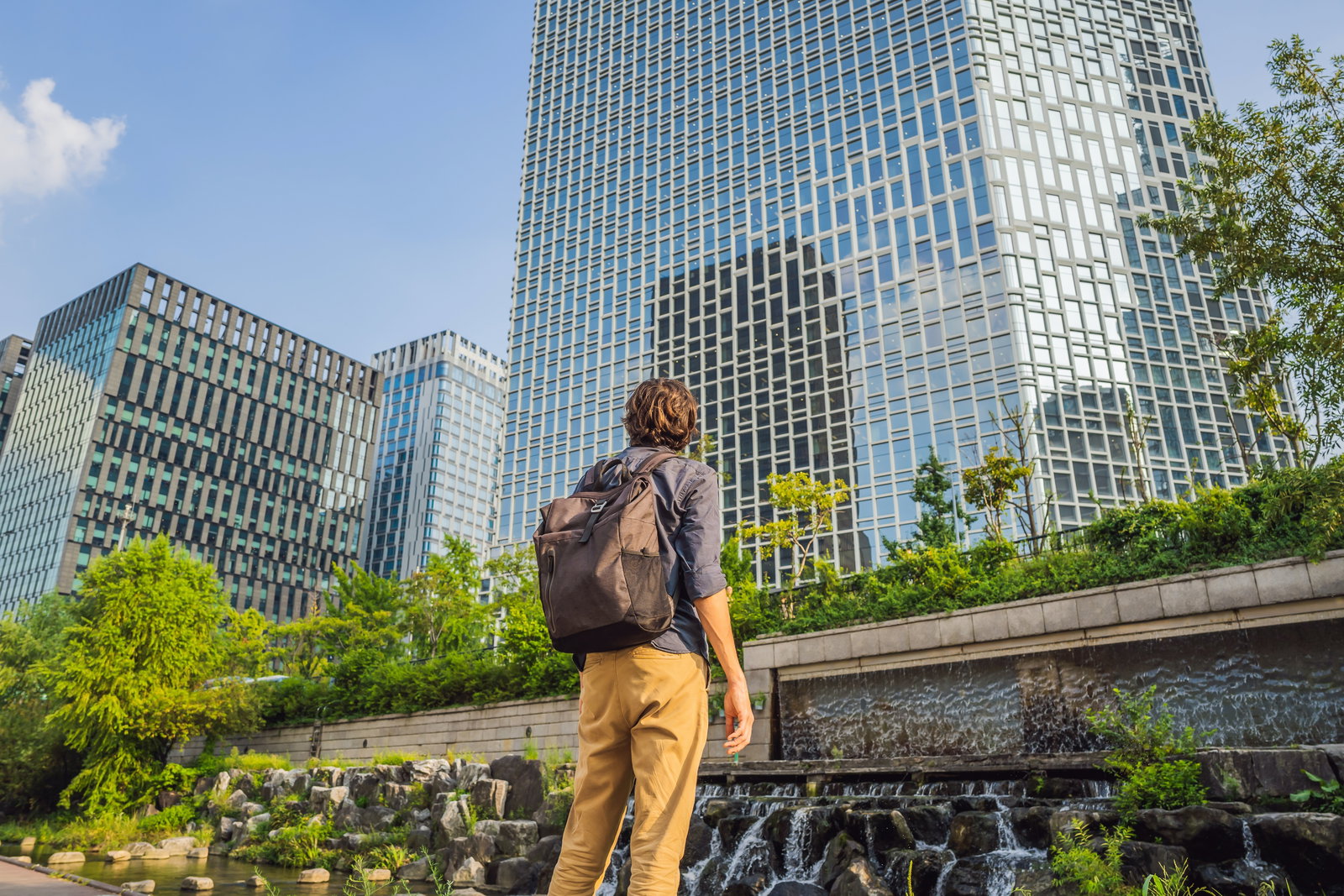 Person looking out to city 