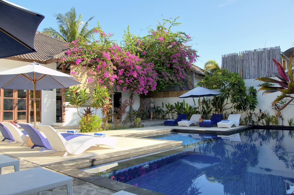 Accommodation pool and lounge chairs at Gili trawangan Indonesia