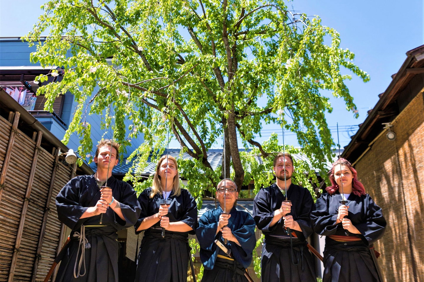 Travellers with samurai swords in japan