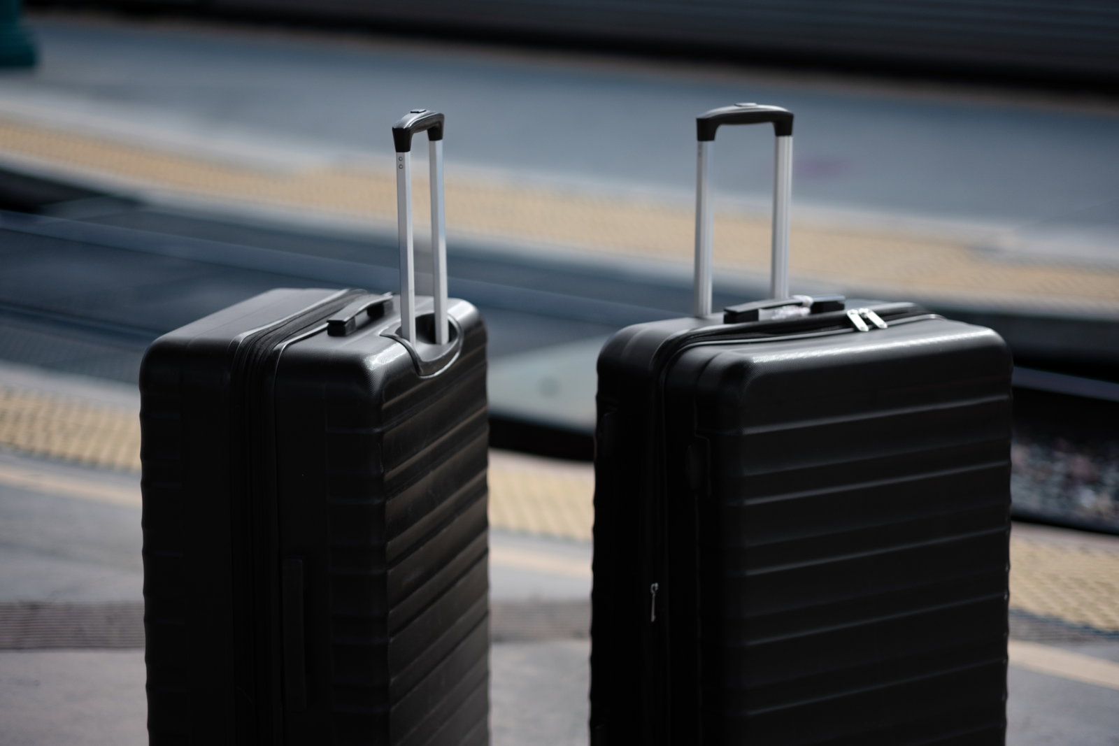 Suitcases on train track 
