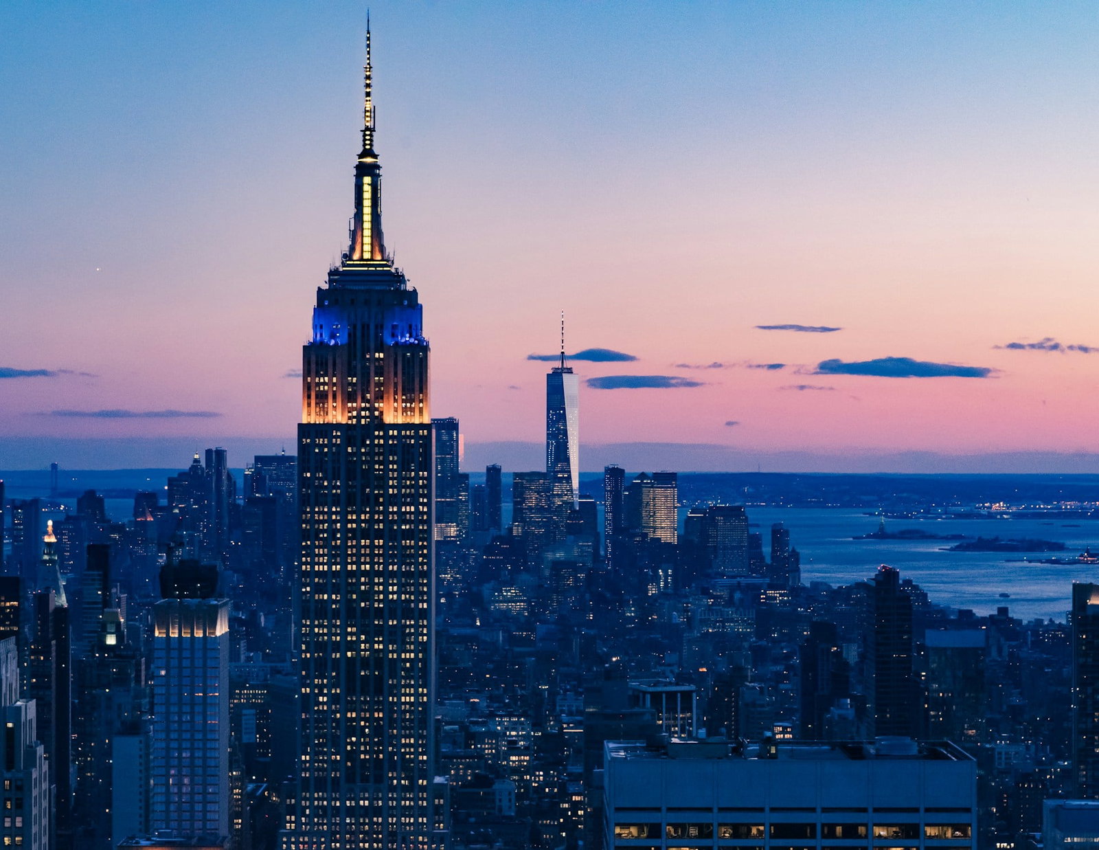 Empire State building and New York skyline at sunset