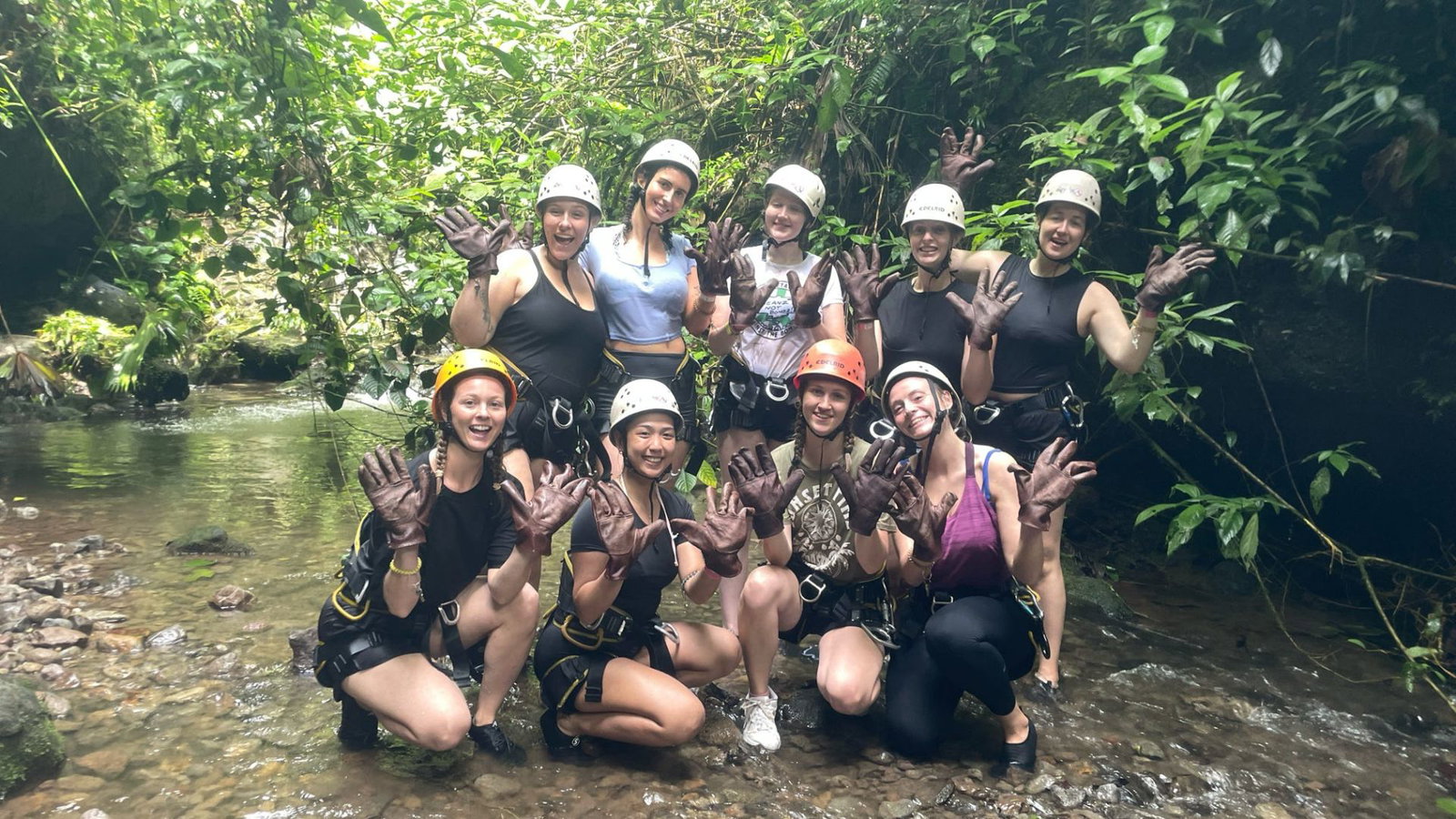 Group of travellers canyoning at La Fortuna
