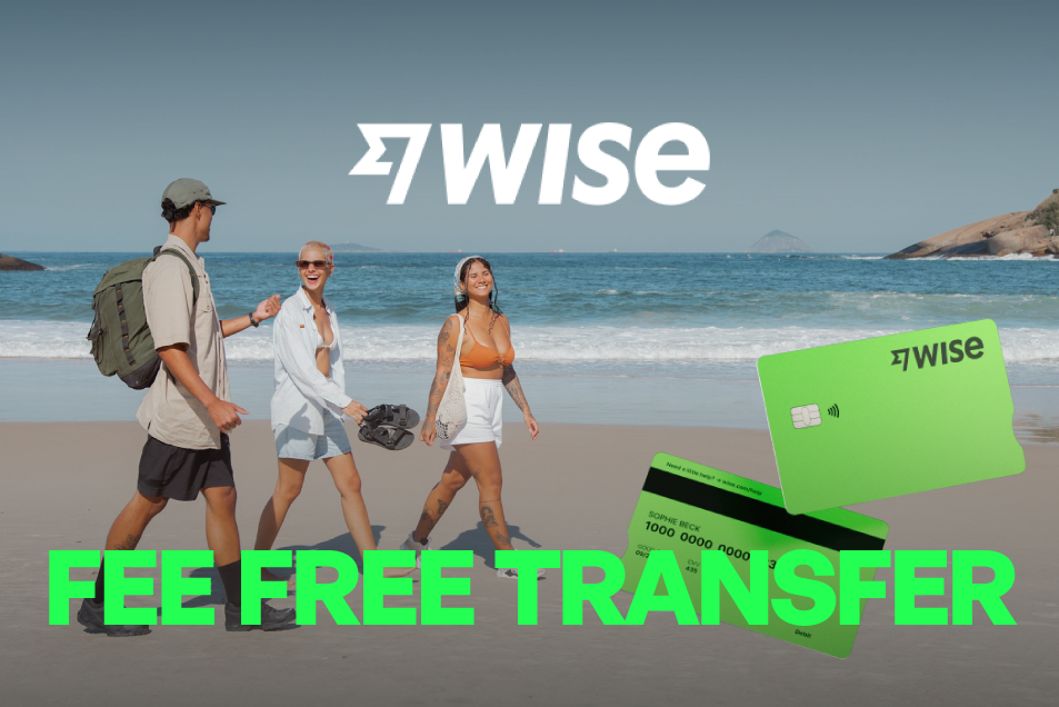 Group travellers on beach. Wise money card fee free transfer